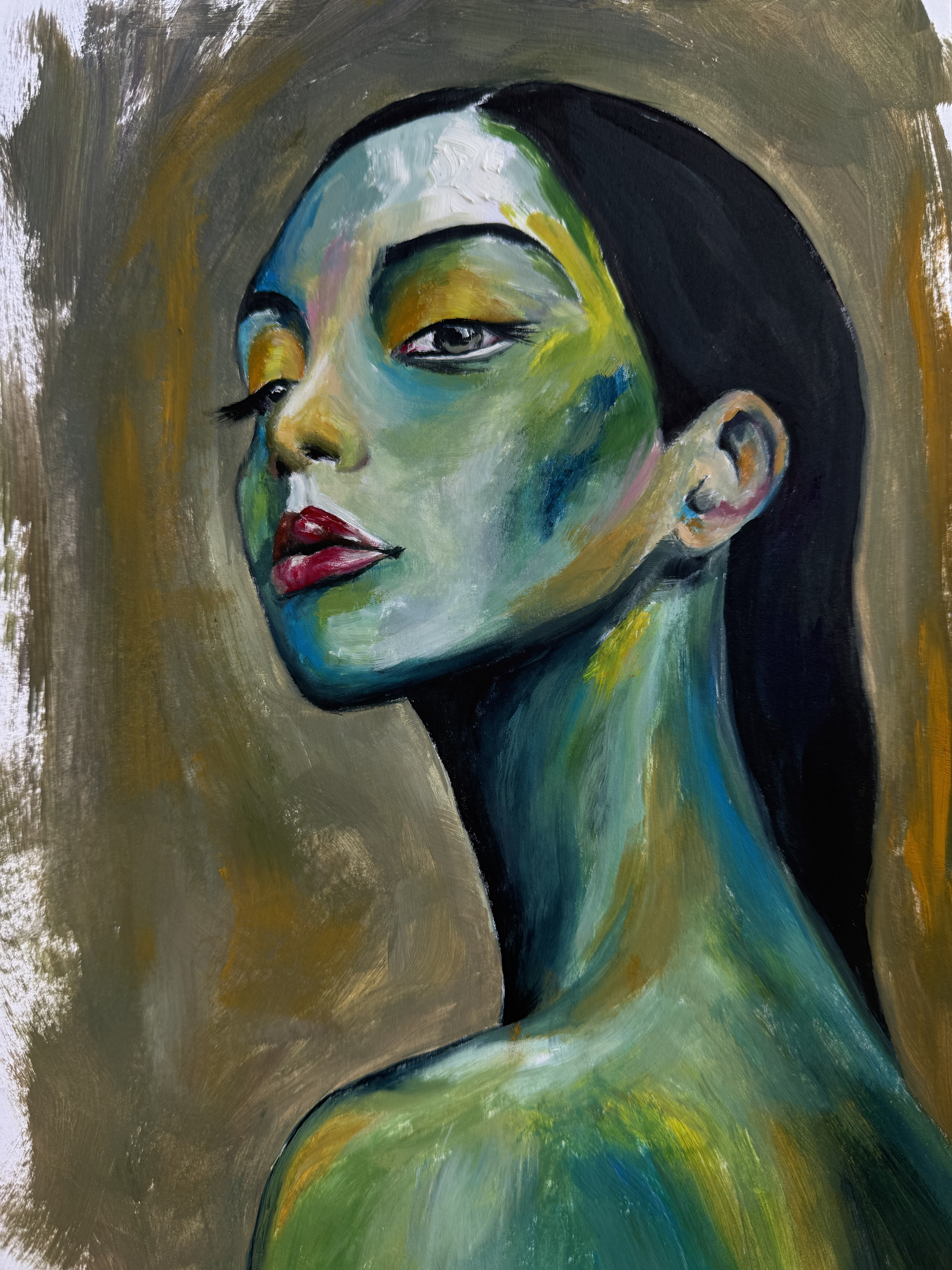 Portrait of a woman with green and blue skin tones against a muted background